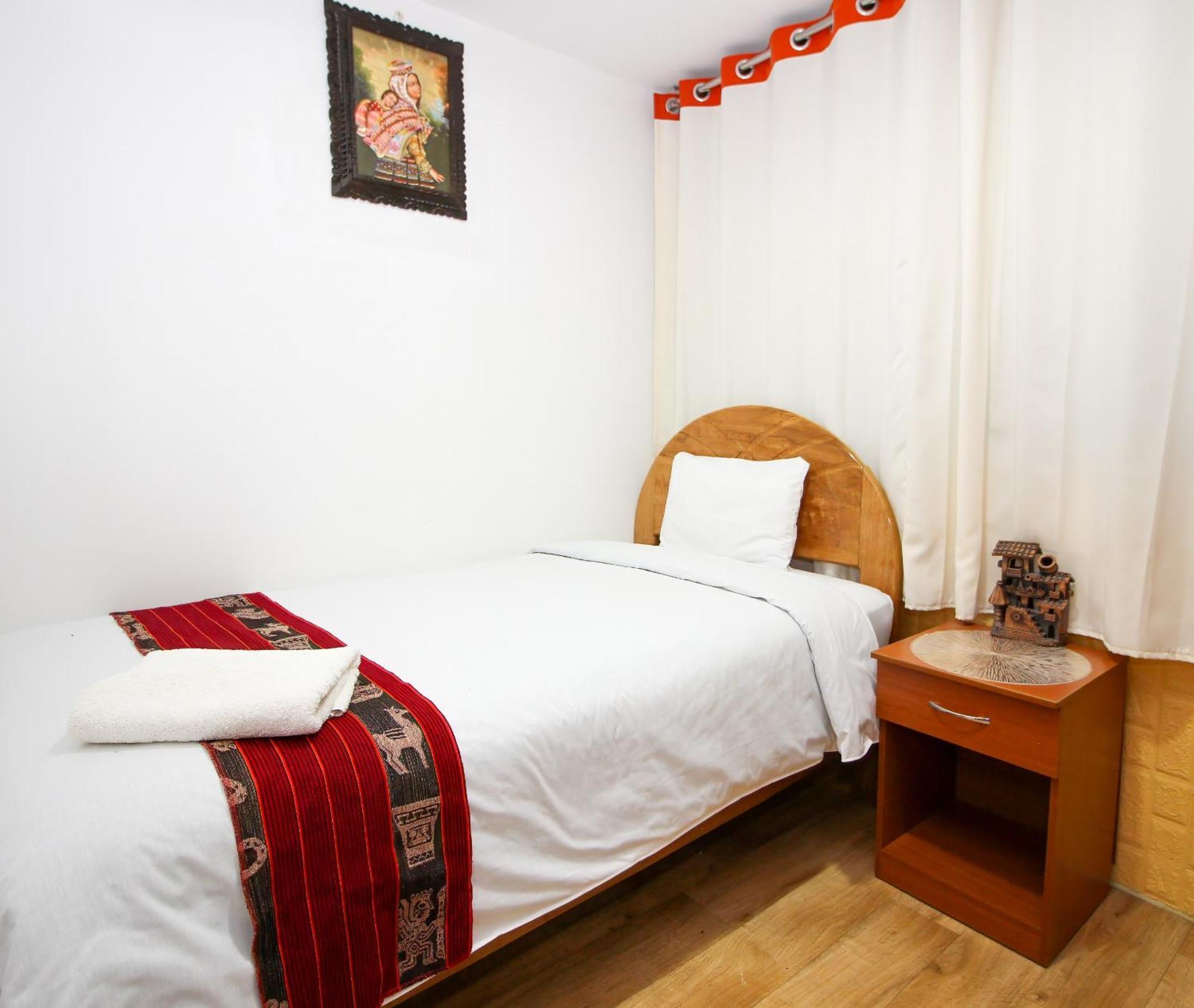 Qori Sisa Pensión Cuzco